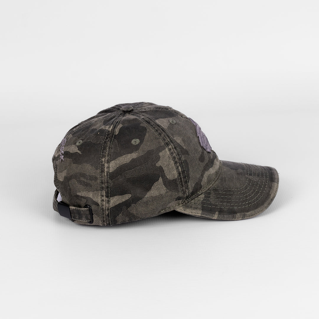 Side profile of the Charcoal Camo Cap showing the peak and crown shape.