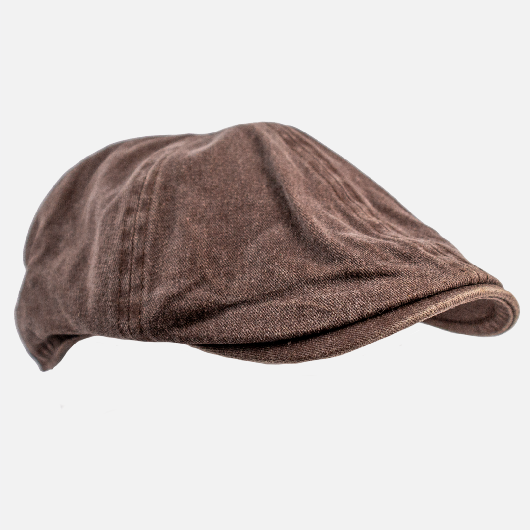 Side profile of the Chocolate Cotton Flat Cap, showing the structured shape.