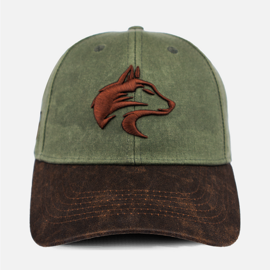 Front view of the Wolf Rock Embroidered Cotton Waxed Cap showing the logo detail.