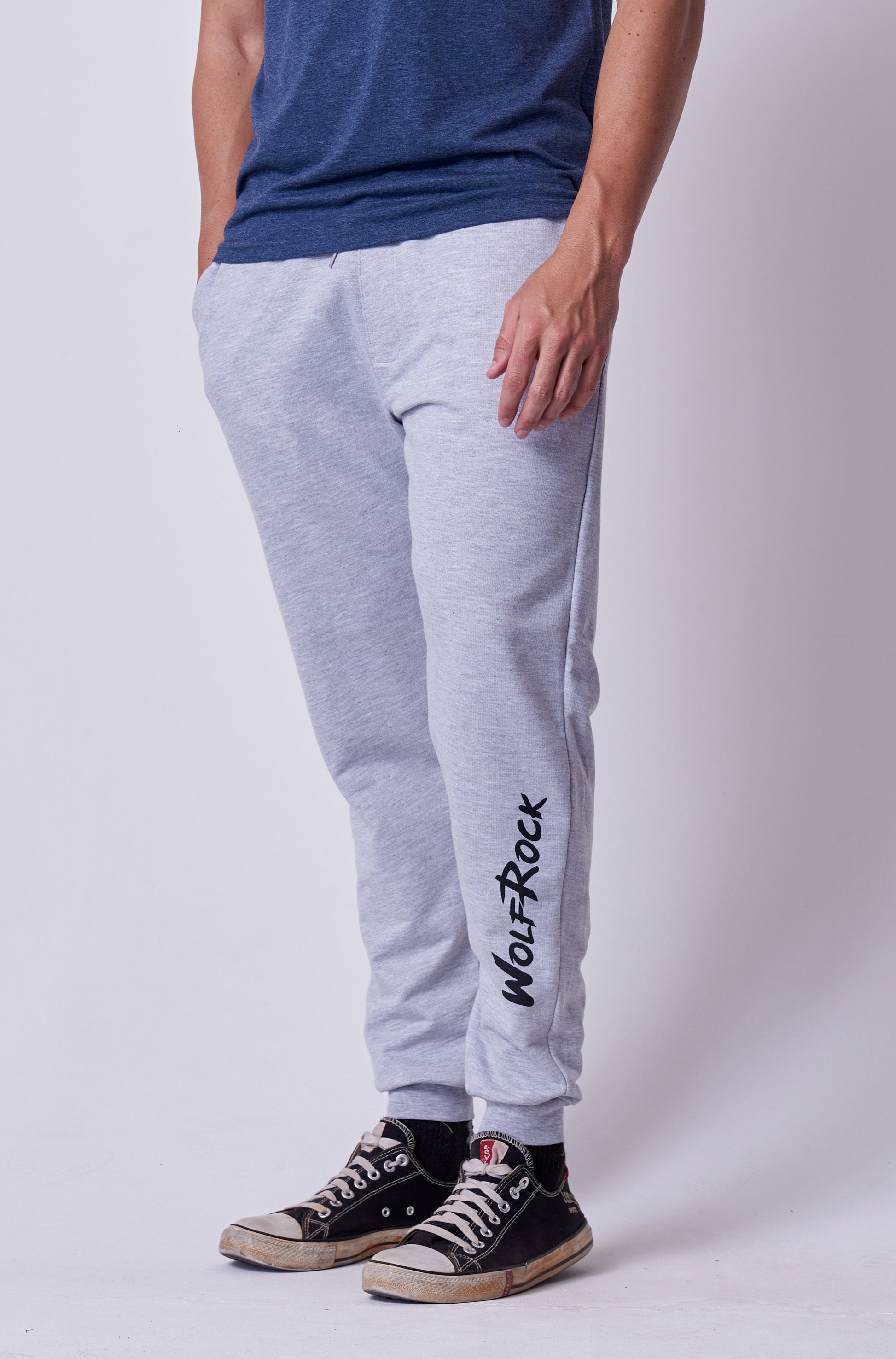 Front view of the Wolf Rock Fleece Jogger Bottoms in Grey Mélange.