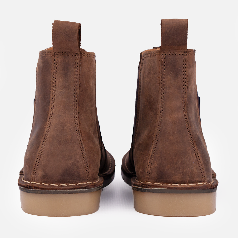 Rear view of a pair of Wolf Rock Harlow boots showing the detailing on the heel.