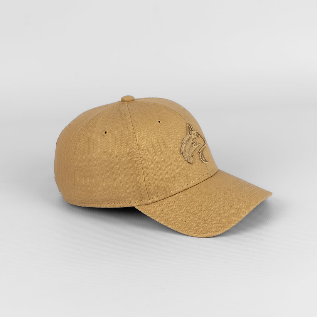 Angled view showing the structured peak and textured fabric of the Khaki Casa Nostra Cap.