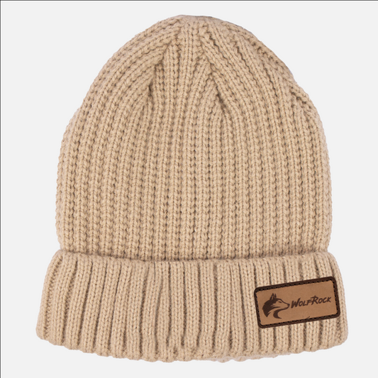A khaki-coloured knitted beanie with a Wolf Rock brand leather patch on the brim.