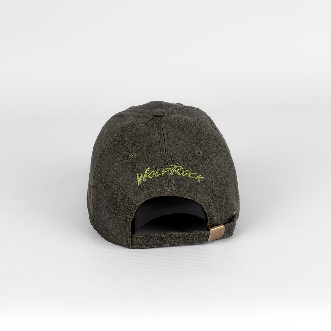 Rear view of the Wolf Rock  Oil Skin Cap in Olive, showing the ventilation eyelets and adjustable strap.