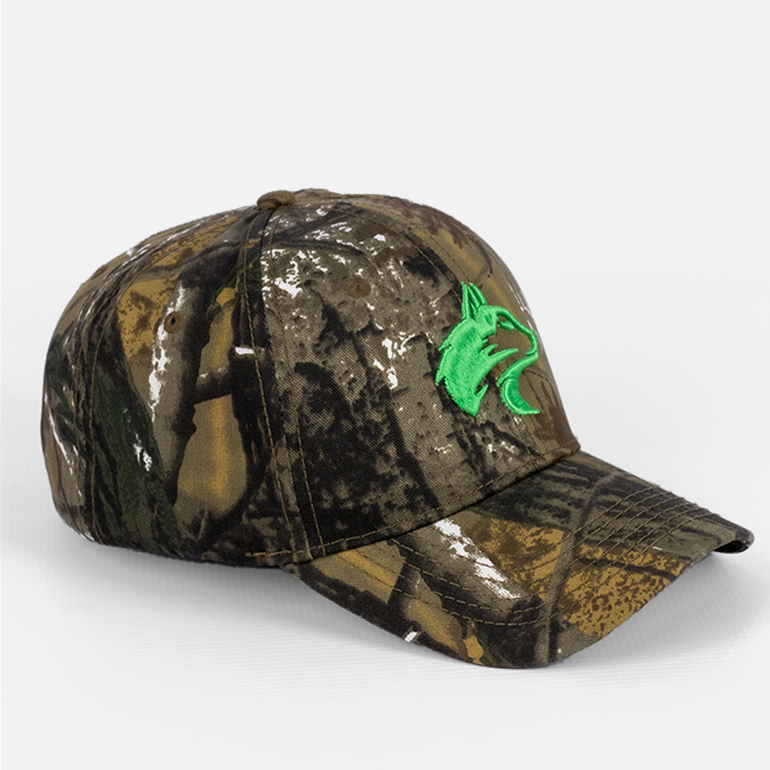 Side profile of the Cotton Pine Camo Cap showing the peak and crown shape.
