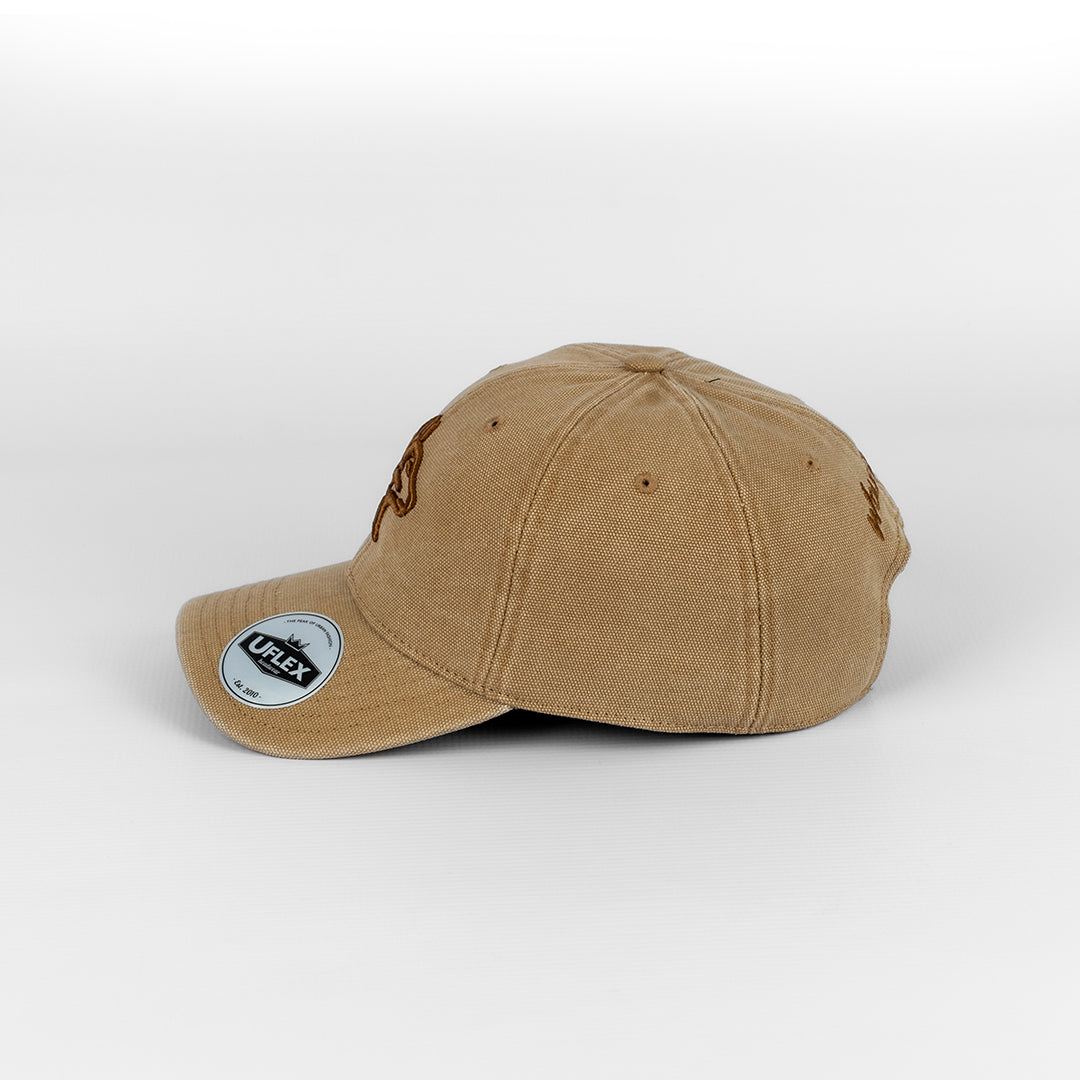 Alternate side profile of the Wolf Rock Tan U-Flex Canvas Cap, showing side panels and U-Flex sticker. 