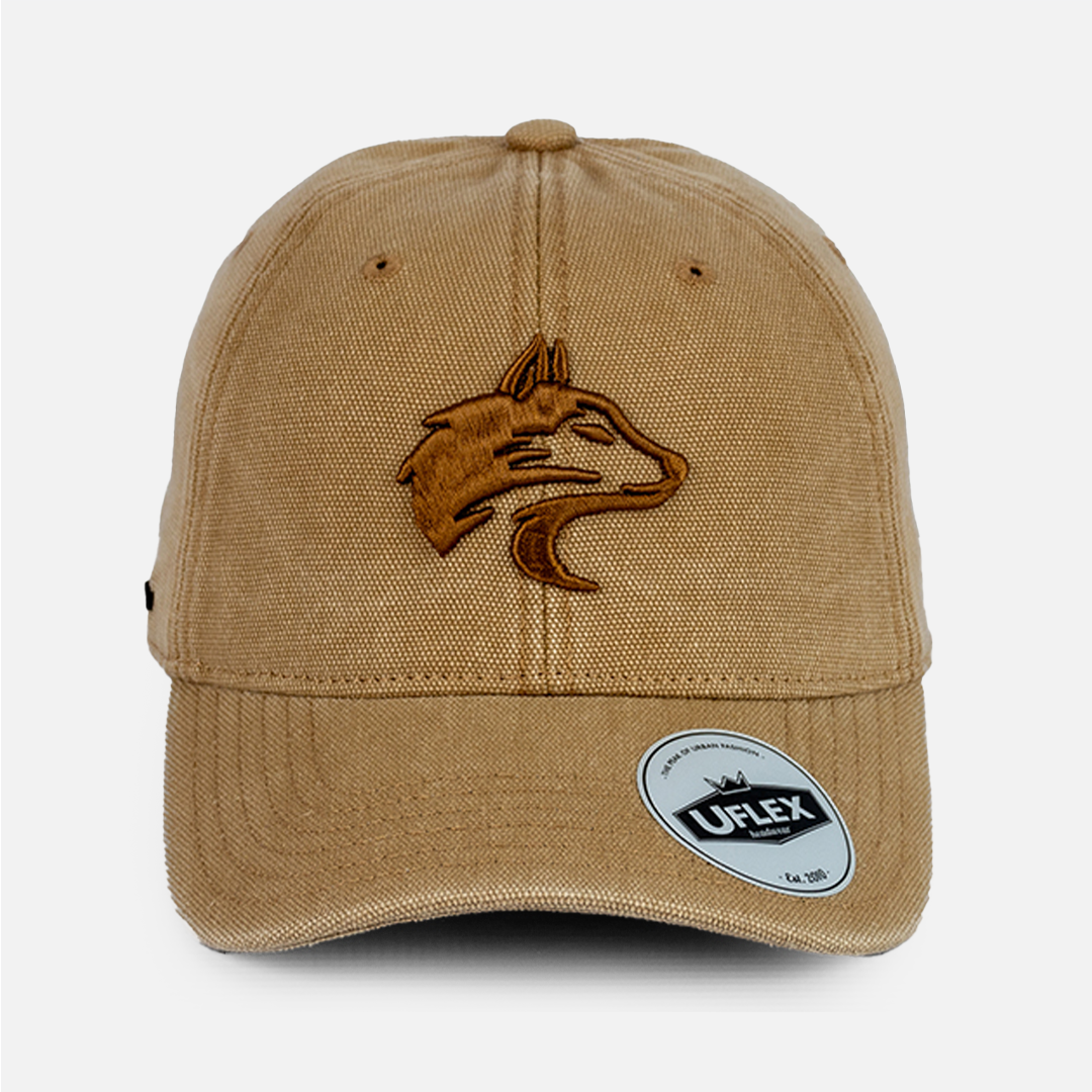 Front view of the Wolf Rock Tan U-Flex Canvas Cap, highlighting the structured but flexible fit.