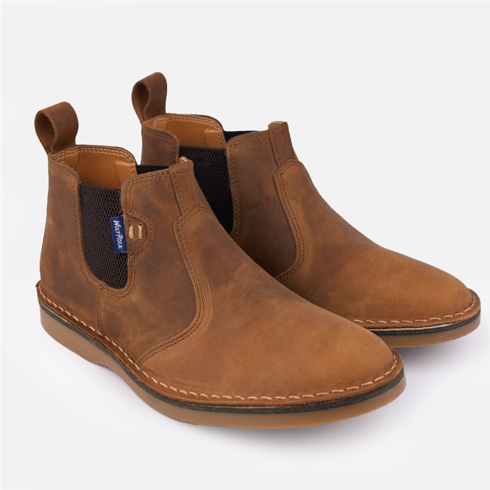A pair of Wolf Rock Timber Mid-Boot in Santiago Dark Choc full-grain leather, a men's casual slip-on gusset boot.
